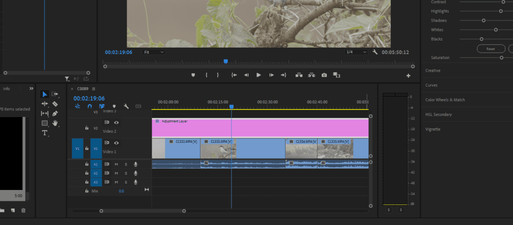 A screenshot of Premiere Pro showing how it looks to have an adjustment layer over the top of your timeline.